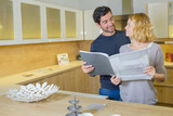 Fototapeta  - Couple in designer kitchen