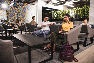 Wall Mural - group of multicultural businesspeople working at modern coworking office