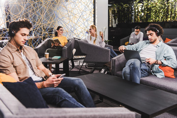 Wall Mural - group of multicultural businesspeople working at modern coworking office