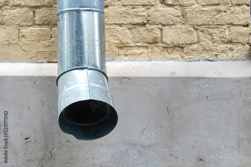 Fotografia, Obraz Shiny drainpipe of old Moscow building with brick wall