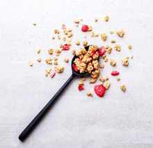 Granola Cereal Bar With Strawberries In A Spoonful Background .Breakfast. Healthy Food Sweet Dessert Snack. Diet Nutrition Concept.Vegetarian Food. Flat Lay.Top View. Copy Space