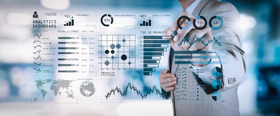 Intelligence (BI) and business analytics (BA) with key performance indicators (KPI) dashboard concept.business documents on office table with smart phone and digital tablet and graph 