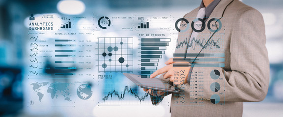 Poster - Intelligence (BI) and business analytics (BA) with key performance indicators (KPI) dashboard concept.business documents on office table with smart phone and digital tablet and graph 