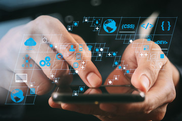 Fototapete - close up of businessman hand working with smart phone in modern office