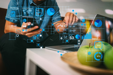 Aufkleber - hipster hand using laptop compter and mobile payments online business,eyeglasses,sitting on sofa in living room,green apples in wooden tray,filter