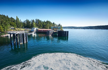 Ferry Approaching The Dock On Shaw Island, San Juan Islands, Washington