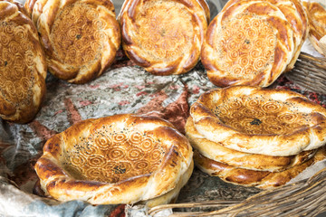 Wall Mural - Traditional uzbekistan bread lavash at local bazaar, is a soft flat-bread of Middle Asia (Uzbekistan).