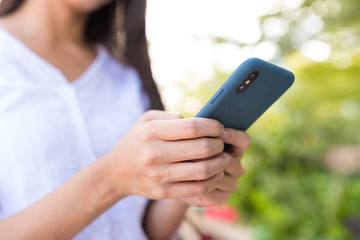 Wall Mural - Woman use of mobile phone at outdoor