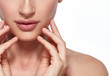 © Utkamandarinka - Lips nose neck woman closeup with hand chin