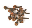 Top view of dry cloves on white background