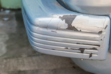 Cracked and peeling paint on car