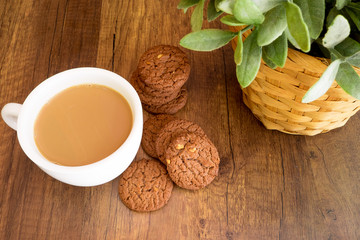 Homemade Chocolate Cookies Eat with hot Coffee on wooden background