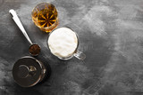 Irish coffee with whisky on dark background. Top view, copy space. Food background