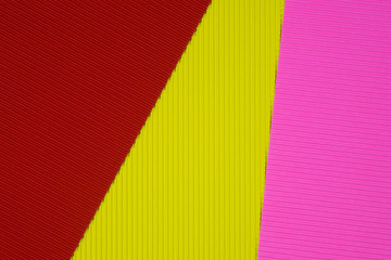 Multi coloured corrugated paper texture, use for background. vivid colour with empty space for add text or object.