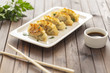 Pan Fried Dumpling, with sauce. Asian food. 
