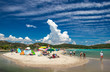 beach with people and clouds