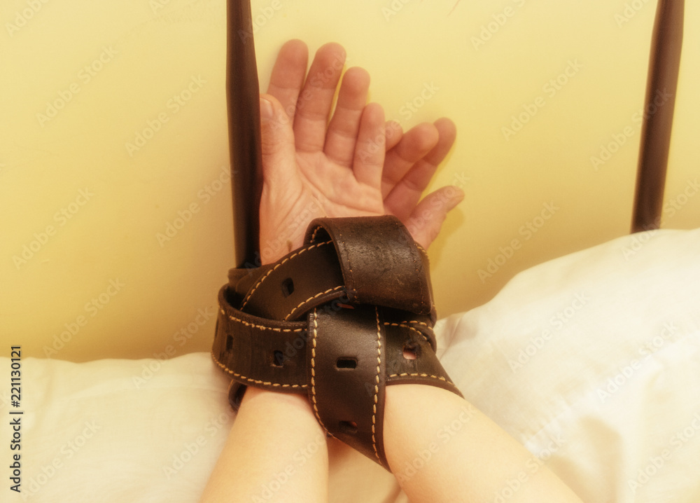 how to tie hands to bed