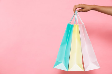 Poster - Cropped image of woman holding packages with purchases