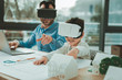 © Viacheslav Yakobchuk - Technological developments. Cute happy boy feeling excited while being in virtual reality glasses