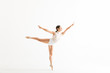 © AntonioDiaz - Graceful Ballerina Doing A Ballet Pose Called Arabesques