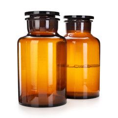 Two brown medical, pharmacy or chemical jars contains clipping path