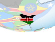 © harvepino - Kenya with flag on globe
