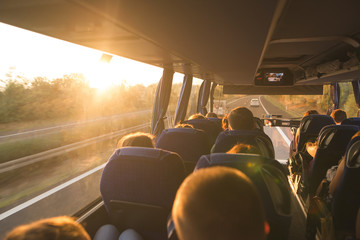 background. travel by bus. bus interior. salon of the bus with people fill the sun with light in the