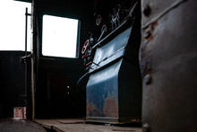 Rusty And Dilapidated Driver's House Of An Old Train Locomotive At Ubex Location With Authentic Industrial Details And Craftsmanship Along The Rail Way And Station