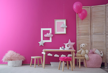 Wall Mural - Modern interior of child game room with table, chairs and toys