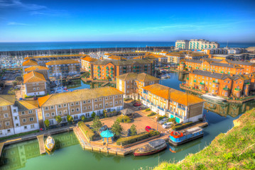 Canvas Print - Brighton marina boats, yachts and apartments East Sussex England UK in bright colourful HDR