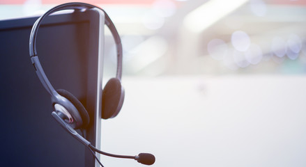 Wall Mural - close up headset earphone for call center occupation concept.