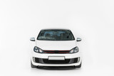 front view of one new white automobile on white