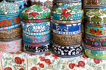 Wall Mural - The traditional Uzbek cap named tubeteika, decorated with multi colored embroidery. Bukhara, Uzbekistan, Central Asia