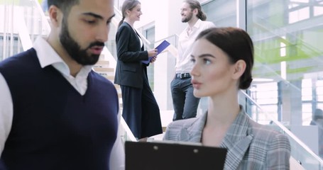 Wall Mural - Business People. Man And Woman Talking At Work In Office