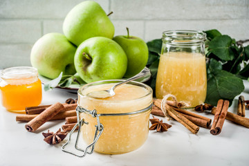 Wall Mural - Homemade apple jam or sauce, with green apples and spices