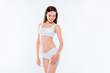 © deagreez - Portrait of thin sportive woman with perfect body in white cotto