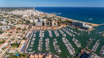 Canvas Print - Aerial view of the bay of the marina, with luxury yachts in Vilamoura.