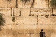 Orthodox jewish man prays at the Wailing Wall