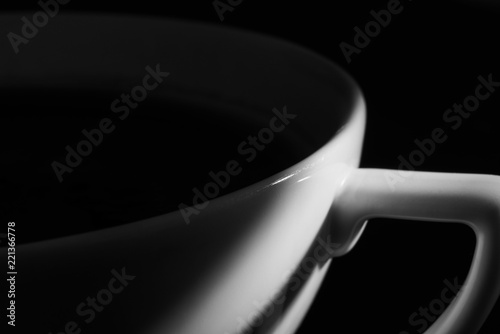 Fotografie, Obraz Black and white contrast photography of a cup with coffee