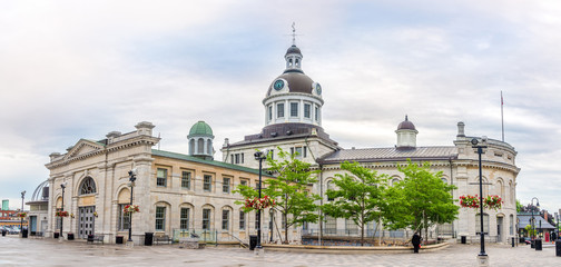 Wall Mural - Panoramic view at the building of City hall with market in Kingston - Canada