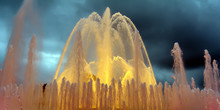 Colorful Performance Of Magic Fountain Of Montjuic In Barcelona, Spain. Show Combines A Spectacular Display Of Music, Water Acrobatics And Lights Which Generate Over 50 Kinds Of Shades And Hues.