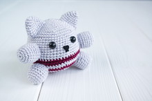 Cake Amigurumi In The Form Of A Kitten. Knitted Toy.