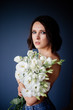 © Alina Kulbashnaia - Beautiful girl with a bouquet flowers.
