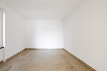 Empty white room with marble floors