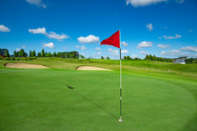 Golf Course And The Red Flag