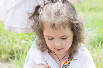 Girl in national costume with embroidery