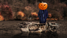 Halloween Scary Pumpkin Headed Ghost Person On A Boat Floating