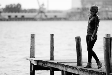 Wall Mural - Sad lonely adult girl day outside