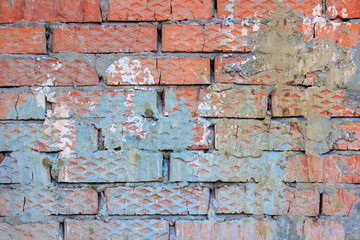 Wall Mural - Vintage red brick wall texture with stains of cement mortar and blue paint. Abstract brick wall background