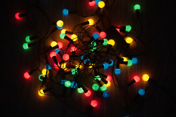 the second garland shines in different colors, the lights of the garland